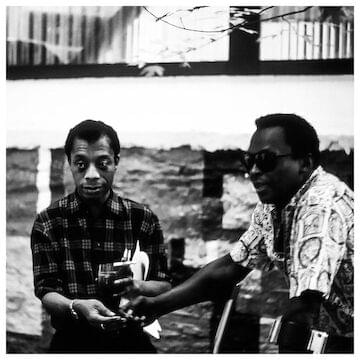 Photo of James Baldwin and Miles Davis